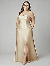 Alt View 1 Thumbnail - Champagne Strapless A-line Satin Gown with Modern Bow Detail