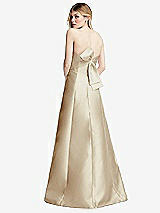 Front View Thumbnail - Champagne Strapless A-line Satin Gown with Modern Bow Detail