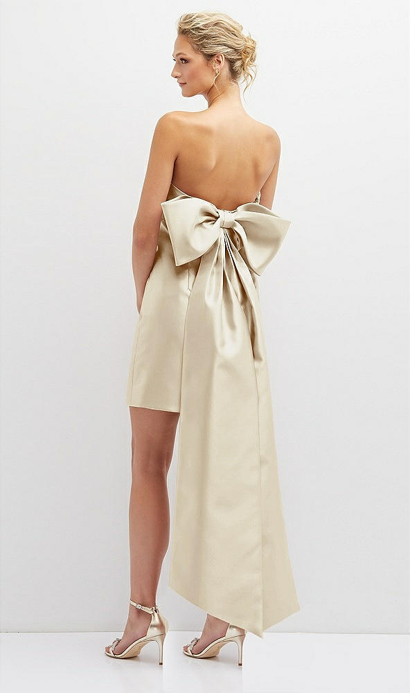 Back View - Champagne Strapless Satin Column Mini Dress with Oversized Bow