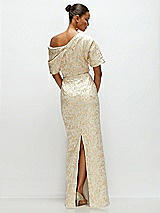 Rear View Thumbnail - Champagne Filigree Asymmetrical Off-the-Shoulder Champagne Filigree Brocade Maxi Dress