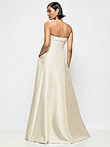 Alt View 3 Thumbnail - Champagne Bow Cuff Strapless Satin Ball Gown with Pockets