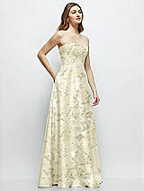 Side View Thumbnail - Butter Yellow Floral Strapless Floral Satin Gown with Full Skirt and Covered Buttons at Back