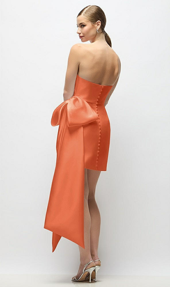 Back View - Portofino Orange Strapless Pleated Draped Satin Mini Dress with Dramatic Long Tail Bow & Covered Buttons