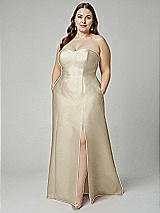 Alt View 1 Thumbnail - Champagne Strapless A-line Satin Gown with Modern Bow Detail